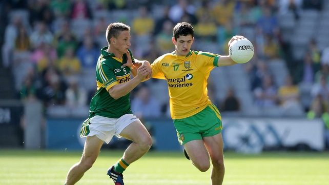 Donegal's Ethan O’Donnell with Brian Sugrue of Kerry