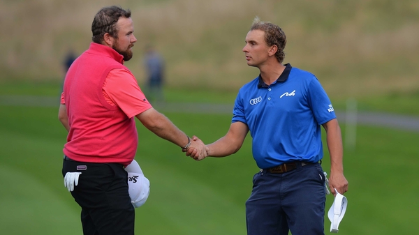 Shane Lowry (left) finished one stroke behind tournament winner Joost Luiten