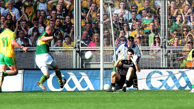 Kieran Donaghy strikes at the Donegal goal....