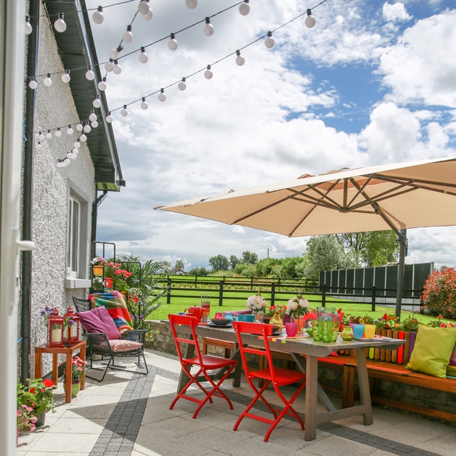 Wooden Bench: Applaro bench in brown wood, €60, Ikea| Wooden Plant box, Askholmen €25 Ikea | Green cushion: Gurli cushion, Ikea: €4 | Lights: Kilometer lights, €16 per set, Ikea, www.ikea.com