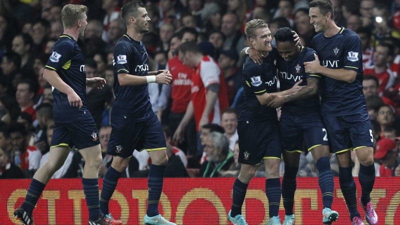 Southampton players congratulate Nathaniel Clyne on his winner at the Emirates