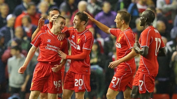 Debutant Jordan Rossiter celebrates with team-mates after scoring the opening goal