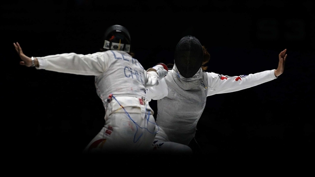 Le Huilin of China and Oh Ha-Na of South Korea compete in the Women's Foil Team Final during the 2014 Asian Games on Wednesday