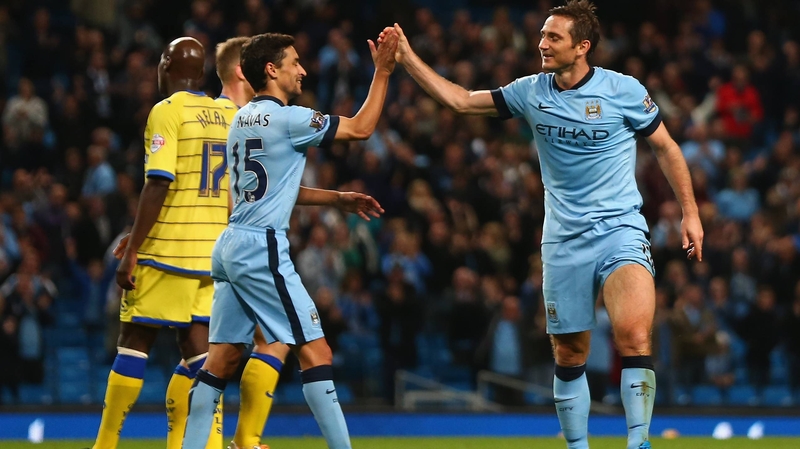 Holders Manchester City cruised past Sheffield Wednesday in the third round