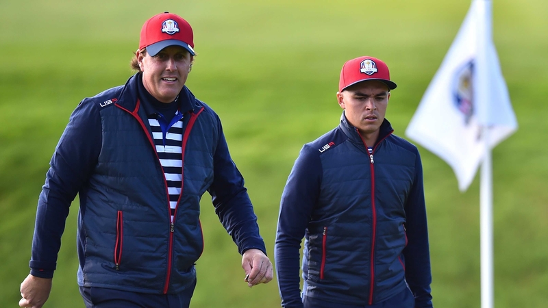Phil Mickelson (left) and Rickie Fowler walk together during a practice round at the Gleneagles