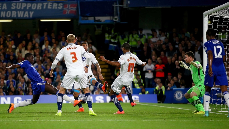 Kurt Zouma of Chelsea scores the first goal during the Captial One Cup Third Round match between Chelsea and Bolton Wanderers
