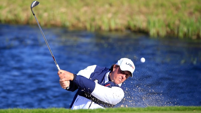 Phil Mickelson holed his putt on the 18th to give the USA an early one-point lead