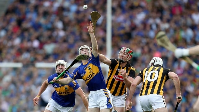 Noel McGrath of Tipperary fights for the ball with Kilkenny's Eoin Larkin