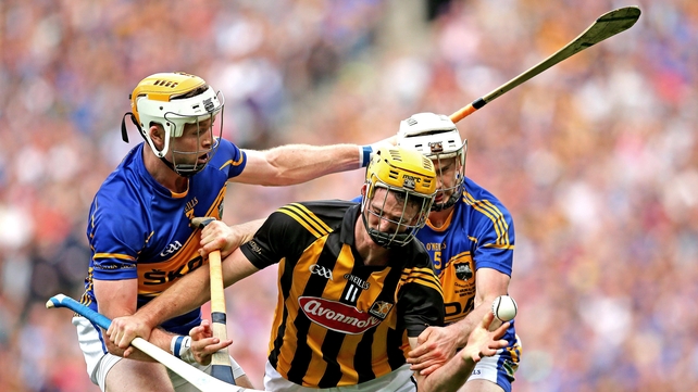 Brendan Maher and Padraic Maher try to get to grips with with Colin Fennelly