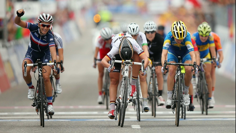 Pauline Ferrand-Prevot punches the air after crossing the line in Ponferrada
