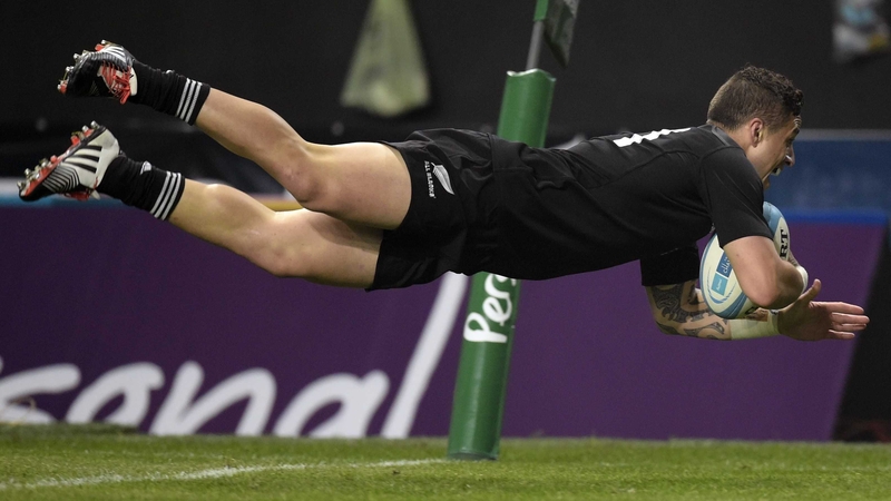 New Zealand scrum half TJ Perenara dives to score the team's fourth try