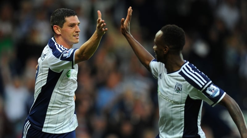 WBA goalscorer Graham Dorrans (L) celebrates his goal with Saido Berahino