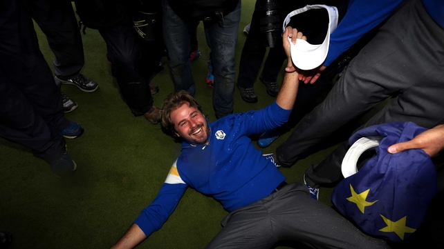 Victor Dubuisson celebrates after winning the Ryder Cup