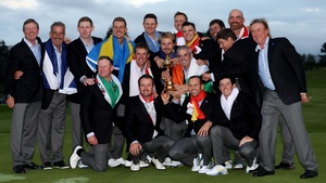 The team celebrate their well-earned victory