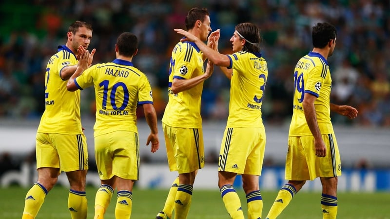 Chelsea players celebrate the only goal of the game in Lisbon