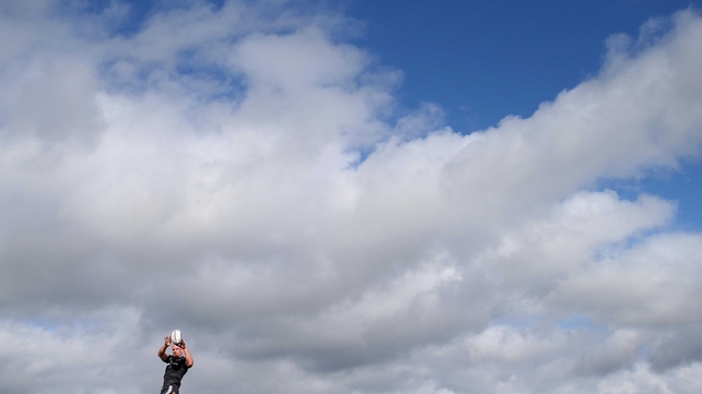 Paul O'Connell rises high to catch the ball during a Munster training session