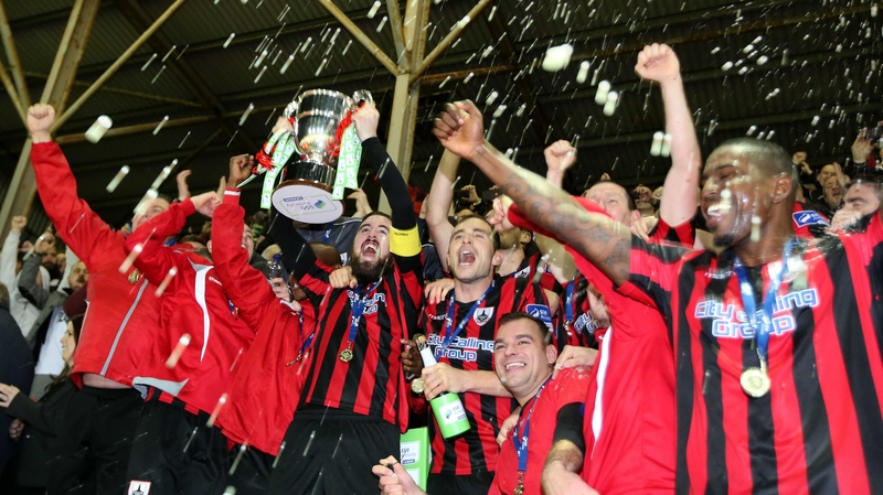 Last year's First Division champions Longford beat the current leaders after a replay in Ballybofey