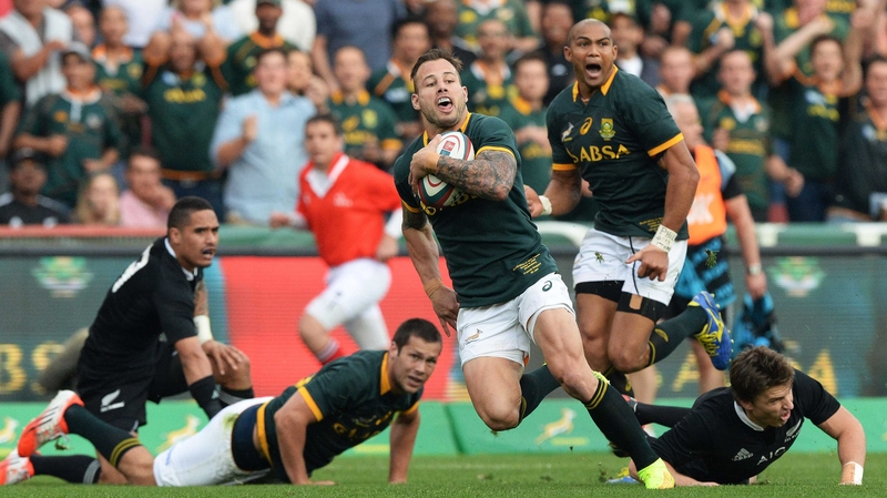 Francois Hougaard on his way to touching down for South Africa