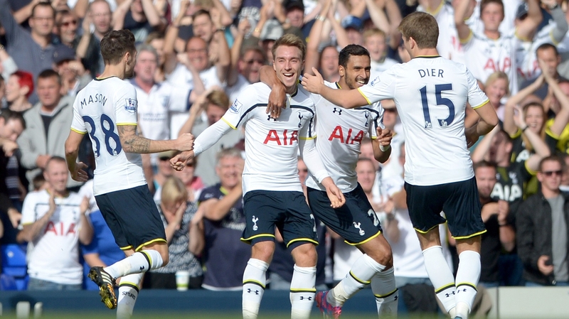 Tottenham Hotspur's Christian Eriksen celebrates scoring with his team-mates