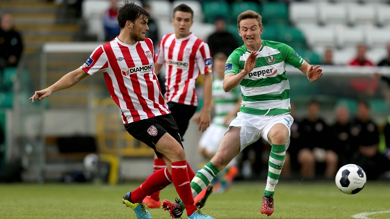 Shamrock Rovers Ronan Finn closes down Phillip Lowry of Derry City