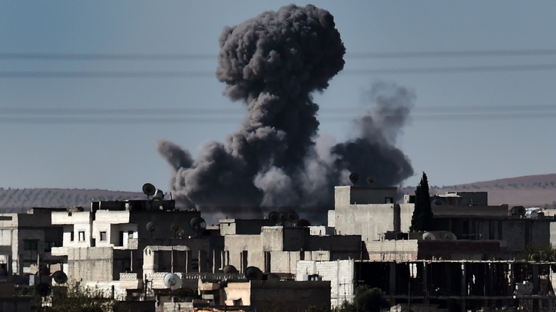 Fighting between Islamic State group militants and Kurdish militia in the key Syrian border town of Kobane