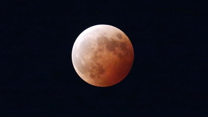 A view of the moon during the total lunar eclipse seen from Busan in South Korea
