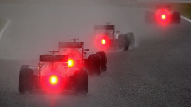 Drivers compete in atrocious conditions during the Japanese Grand Prix at Suzuka