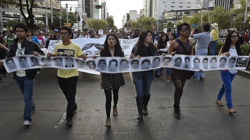 Protesters march during a demonstration in Mexico City