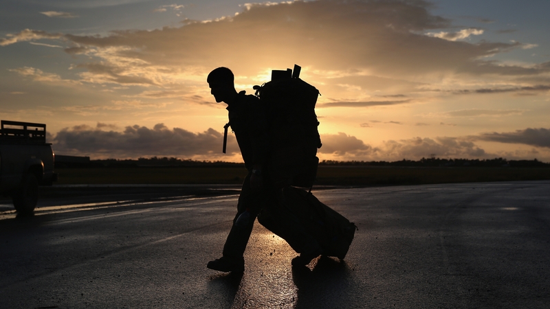 A US Marine arrives to take part in Operation United Assistance in Monrovia, Liberia