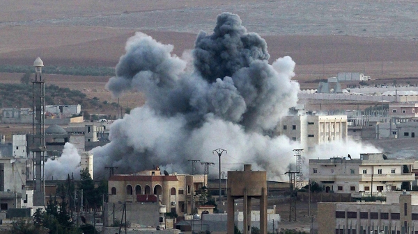 Smoke rises in the Syrian town of Kobane