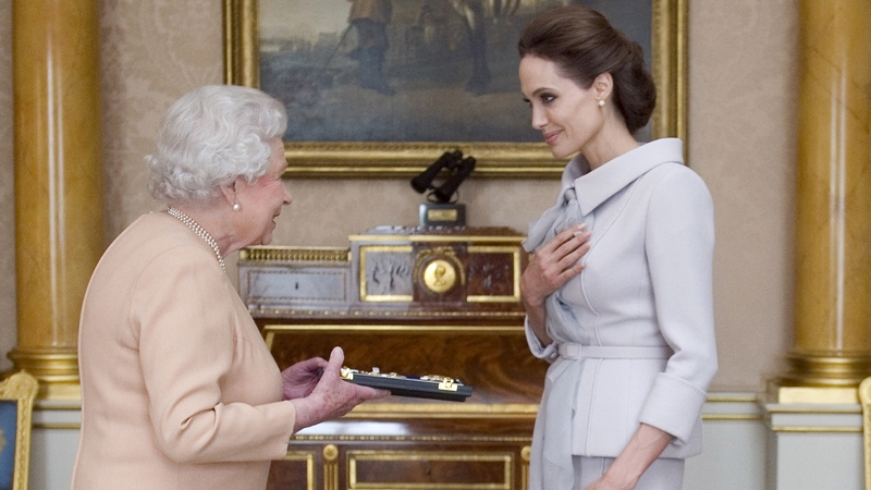 The Queen presented Angelina Jolie with her honorary Dame insignia