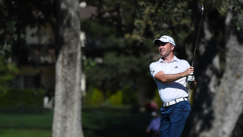 Martin Laird hits from the fairway on the 18th hole