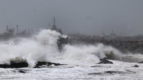 Large waves hit the coastline ahead of Cyclone Hudhud making its expected landfall in Visakhapatnam