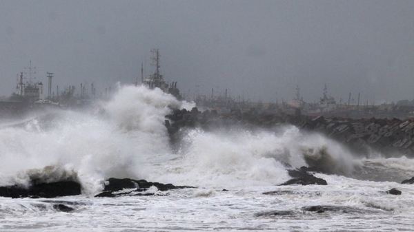Large waves hit the coastline ahead of Cyclone Hudhud making its expected landfall in Visakhapatnam