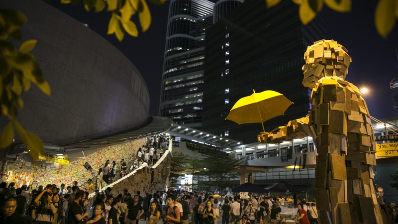 Protesters dismiss a plan to vote for pre-vetted candidates as 'fake democracy'