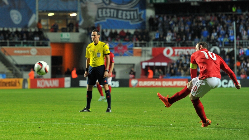 Wayne Rooney scores from a free kick against Estonia