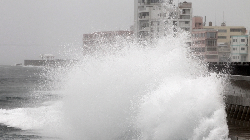 Large waves generated by typhoon Vongfong hit the coast in Hamagawa, Chatan town