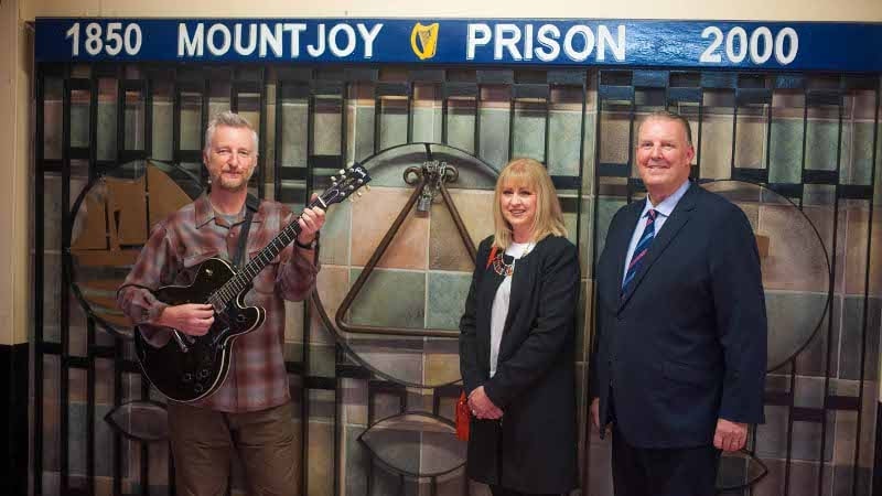 Pictured l to r at the Auld Triangle is Billy Bragg, Deborah Blacoe, Phil Chevron's sister, and Mountjoy Jail Campus Governor Brian Murphy