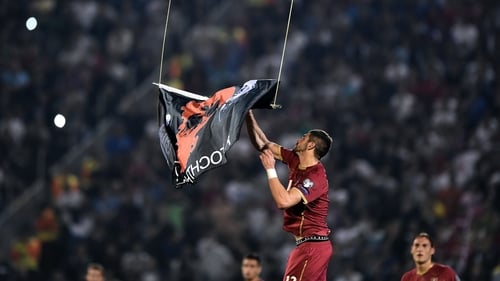 The flag was hauled down by Serbia defender Stefan Mitrovic and then brawls erupted involving players, officials and fans