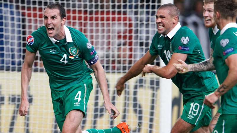 John O'Shea wheels away in delight after scoring Ireland's late, late equaliser