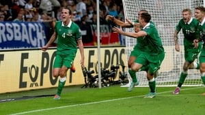 Ireland's sternest test came away to Germany and John O'Shea was the hero with a dramatic 94th minute equaliser, while winning his 100th cap