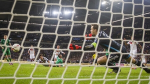John O'Shea (c) scores past German goalkeeper Manuel Neuer