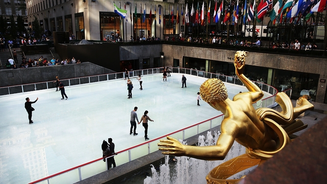 People skate on the newly opened ice rink at Rockefeller Centre in New York