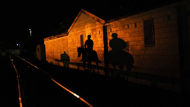 Horses make their way to the track before a Melbourne trackwork session at Caulfield racecourse