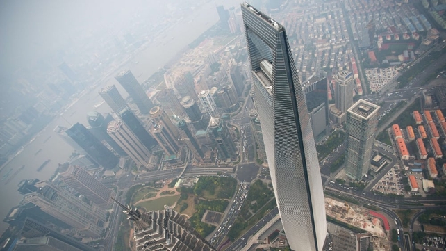 Shanghai World Financial Center and the skyline of the Lujiazui Financial District in Pudong, seen from the 109th floor of the Shanghai Tower