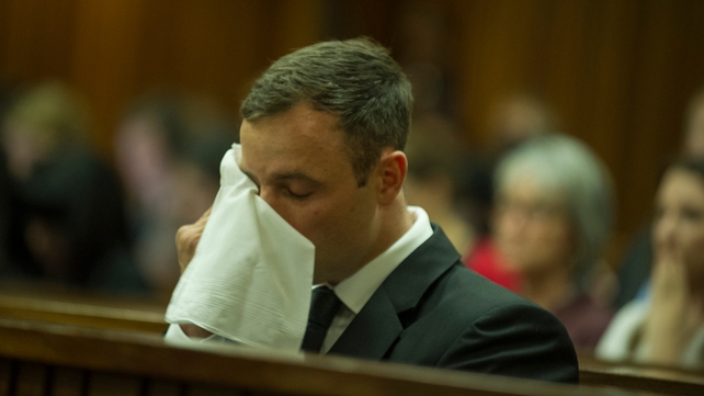 Oscar Pistorius wipes tears from his face during day 5 of sentencing at the High Court in Pretoria