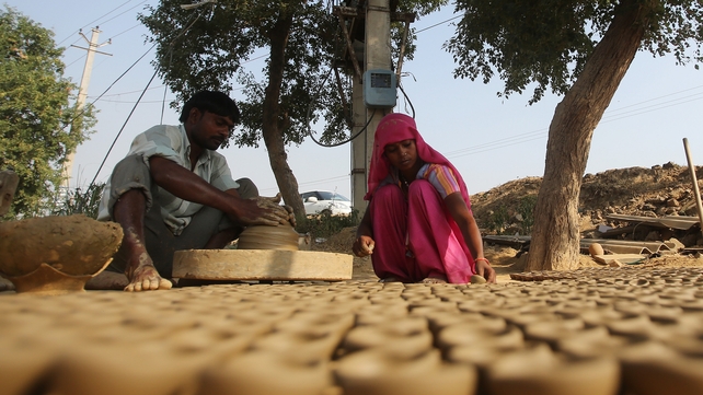 An Indian potter makes earthen lamps for the upcoming festival of Diwali pace up in Faridabad