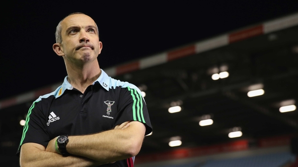 Conor O'Shea, the Harlequins director of rugby looks on during the game