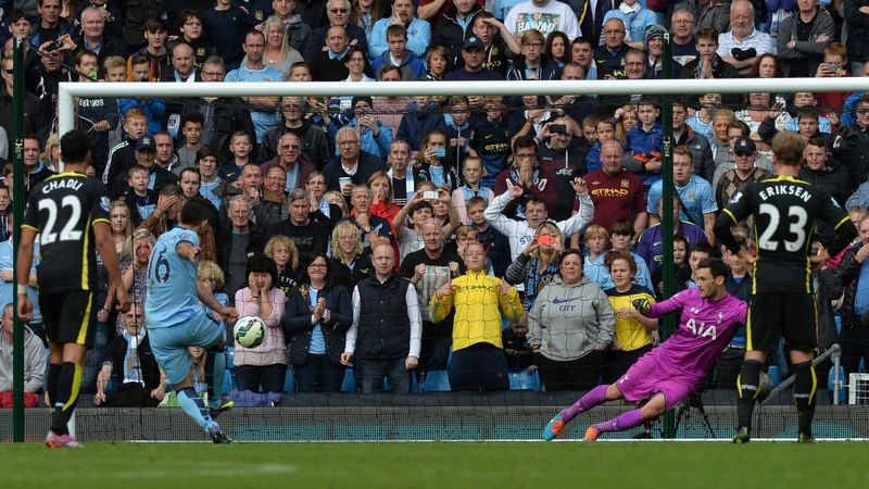 Sergio Aguero smashes home his third, from the penalty spot