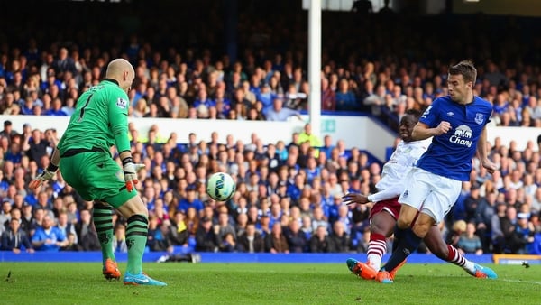 Seamus Coleman prods home Everton's third